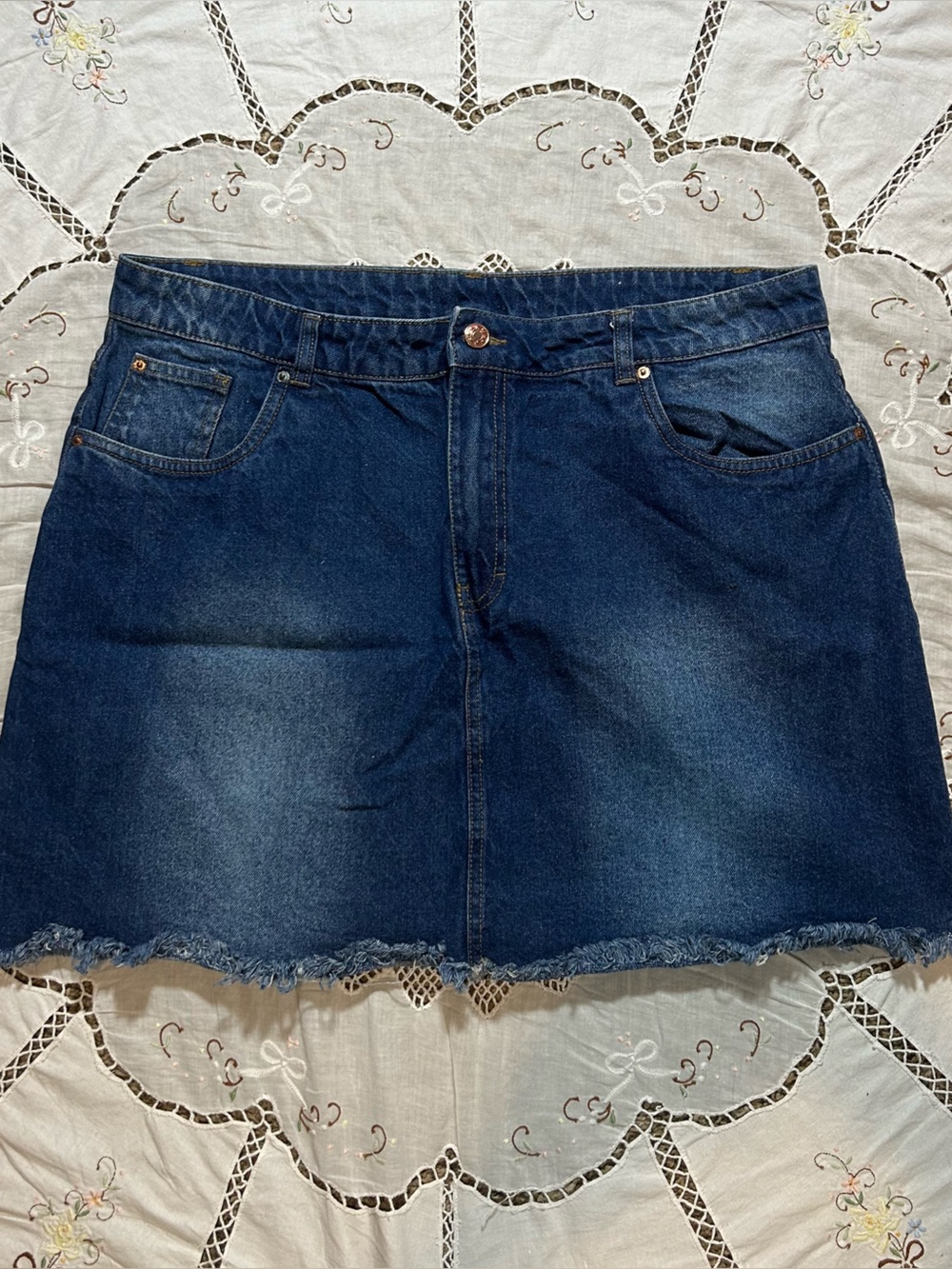 Denim skirt with frayed bottom
